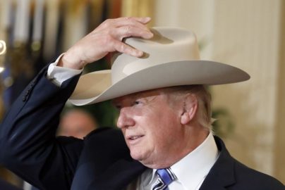 trump-cowboy-hat-usa-jobs-photocredit-voanews-com