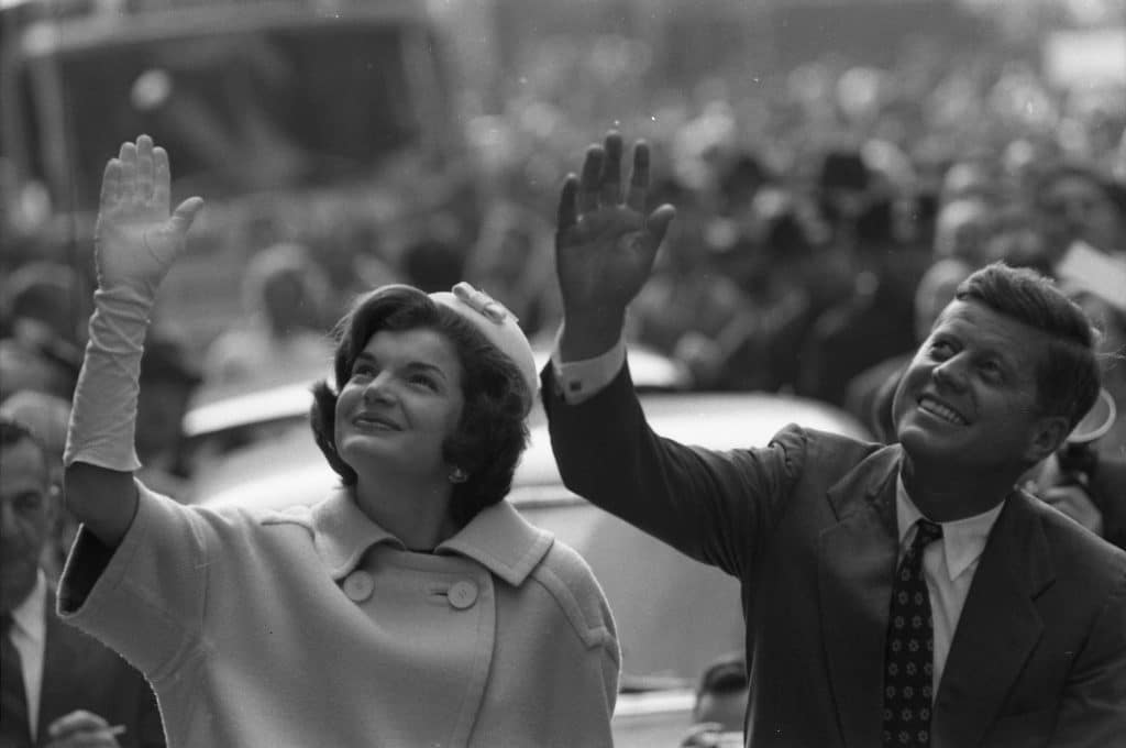 The Kennedys Wave From Convertible