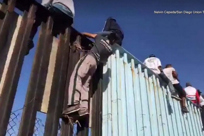 Screenshot - 11_14_2018 , 7_22_19 PM migrant caravan us border fence fox 5 san diego