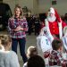 US First Lady Melania Trump attends with Father Christmas personificator a Toys for Tots event at Joint Base Anacostia-Bolling in Washington, DC, on December 11, 2018. - Toys for Tots is a program run by the United States Marine Corps Reserve which distributes toys to children whose parents cannot afford to buy them gifts for Christmas. (Photo by NICHOLAS KAMM / AFP) (Photo credit should read NICHOLAS KAMM/AFP/Getty Images)