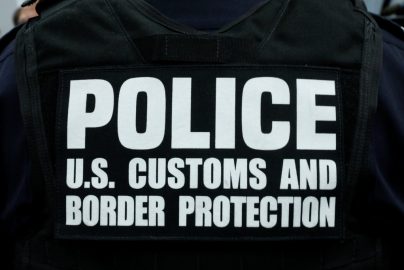 A U.S. Customs and Border Protection officer attends a speech by U.S. Attorney General Jeff Sessions about the Trump Administration efforts to combat the opioid crisis at John F. Kennedy International Airport in New York