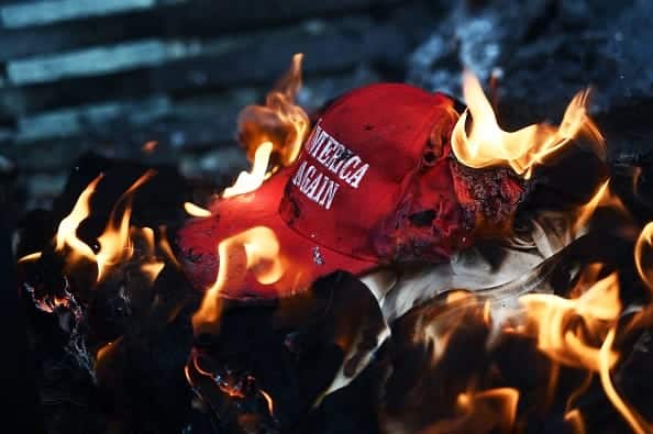 trump-supporters-maga-hats-burning-beinglatino-me-2020-truth