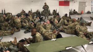 biden-incompetence-national-guard-troops-floor-unheated-parking-garage-washington-dc-cnn-com-2021-truth