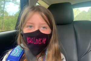 little-girl-Jesus-loves-me-face-mask-school-nypost-com-2021-truth