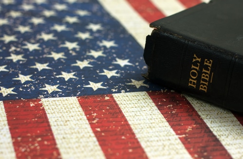 Old Holy Bible and the American Flag