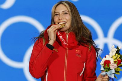 2022 Beijing Olympics - Victory Ceremony - Freestyle Skiing - Women's Freeski Big Air - Beijing Medals Plaza, Beijing, China - February 8, 2022. Gold medallist Gu Ailing Eileen of China celebrates on the podium. REUTERS/Tyrone Siu