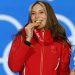 2022 Beijing Olympics - Victory Ceremony - Freestyle Skiing - Women's Freeski Big Air - Beijing Medals Plaza, Beijing, China - February 8, 2022. Gold medallist Gu Ailing Eileen of China celebrates on the podium. REUTERS/Tyrone Siu