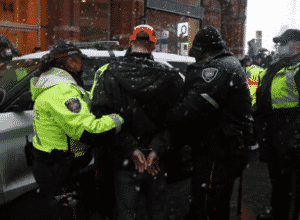 Screenshot-2_19_2022-3_37_36-AM-ottawa-freedom-protesters-arrested-newsmax