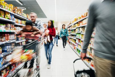 Busy Supermarket Aisle With Customers