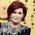 FILE - Sharon Osbourne arrives at the 71st Primetime Emmy Awards on Sept. 22, 2019, in Los Angeles. CBS says Sharon Osbourne will no longer appear on its daytime show "The Talk" after a heated on-air discussion about racism earlier this month. (Photo by Jordan Strauss/Invision/AP, File)
