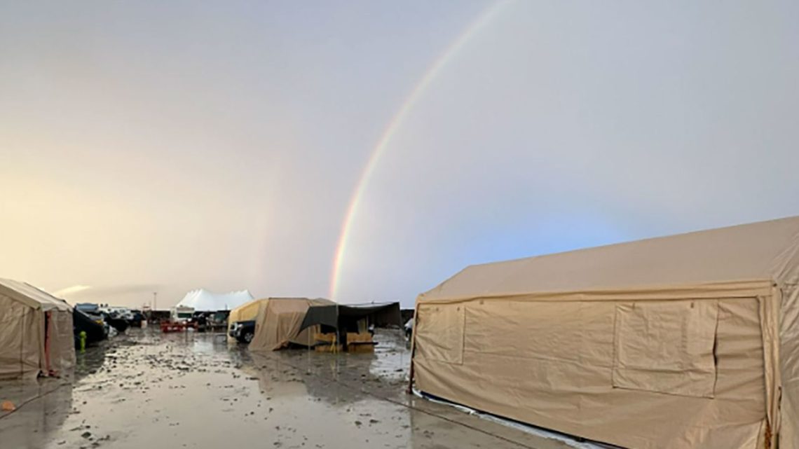 burning-man-mud-rainstorm-rainbow-cnn-com-2023-truth