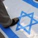 zionism-stepping-on-israel-flag-nytimes-com-2024-truth