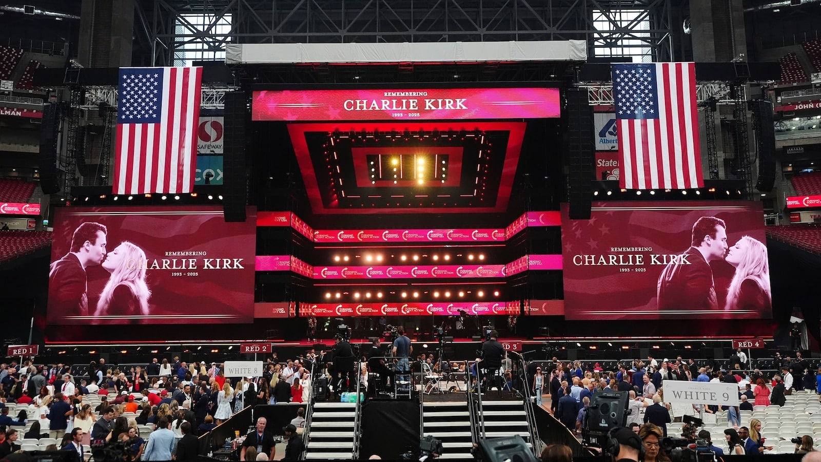 charlie-kirk-memorial-stage-signs-kissing-wife-ericka-abcnews-go-com-2025-truth